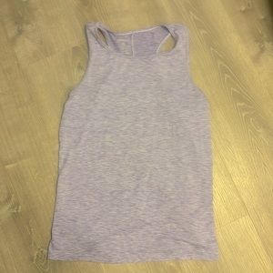 Reebok women’s purple athletic tank with back slit size XL EUC